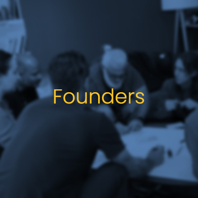 Founders collaborating on business foundation alignment during a BlueBirds Group strategic workshop focused on reducing founder dependency and building durable businesses.